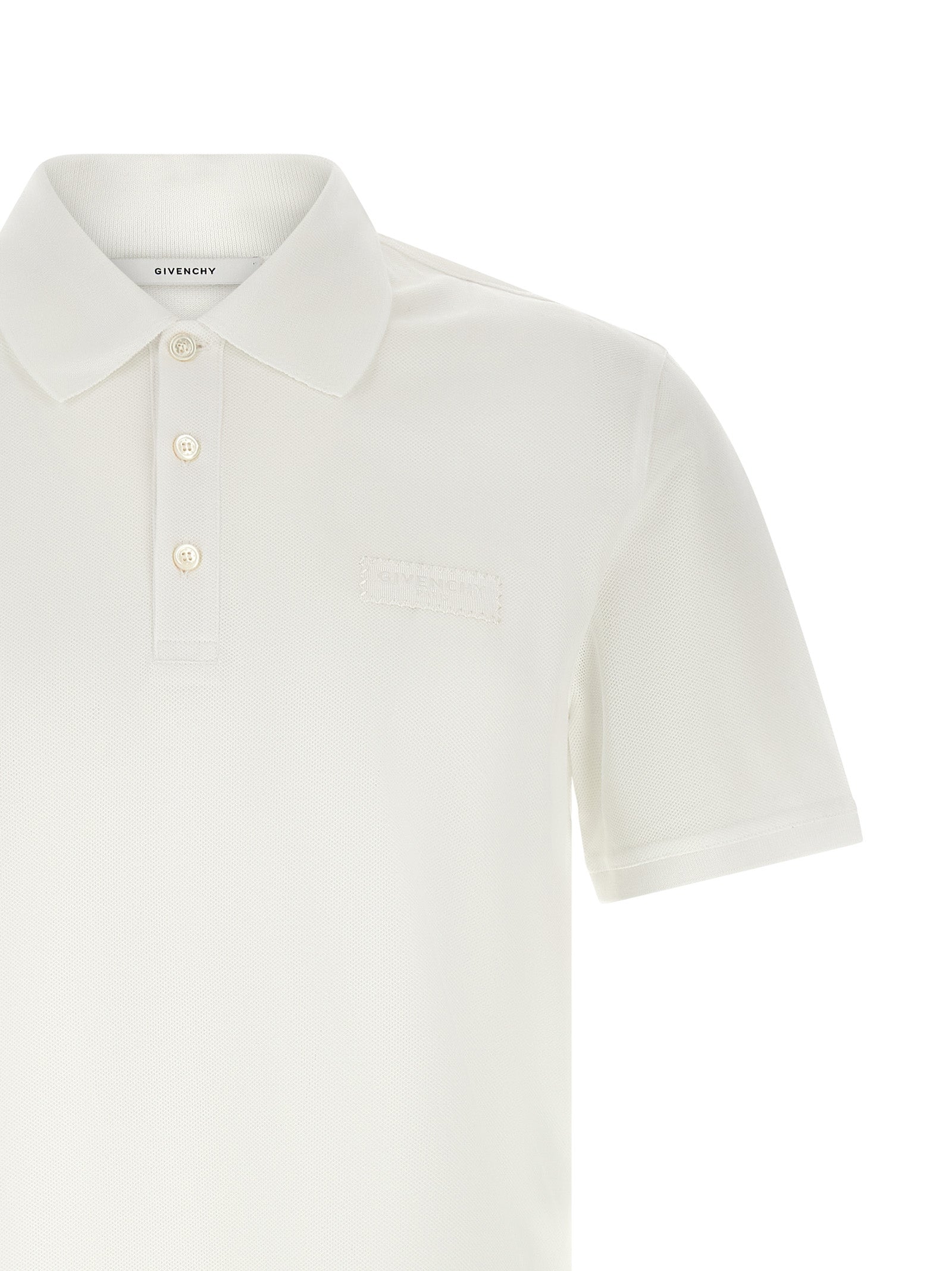 Polo Shirt by Givenchy for men in cotton white presents a crisp silhouette, artfully detailed with a crisp and crisp .