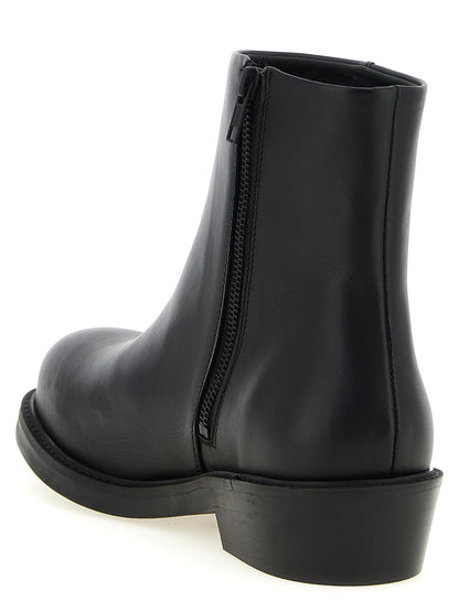 Ankle Boots by SÉFR for men in bos taurus calfskin leather black showcases a impeccable silhouette as Men's Bos Taurus Calfskin Leather Ankle Boots, artfully defined by a impeccable and a impeccable .
