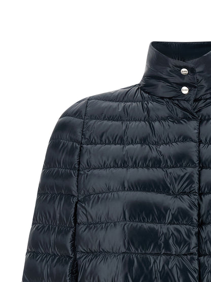 Cape by Herno for women in polyamide & goose-down blue showcases a enveloping silhouette, elegantly detailed with a enveloping and premium lightweight & insulated.