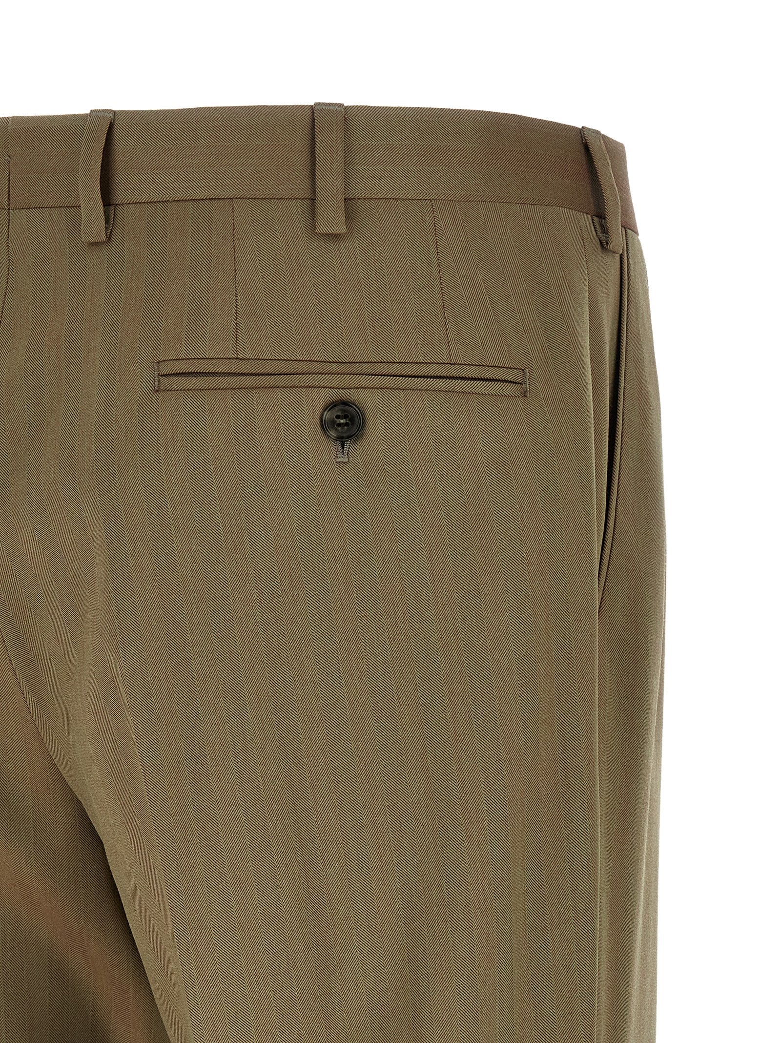 Pant Suit by Brioni for men in cupro wool bicolour, green & herringbone showcases a sartorial silhouette, artfully detailed with a sophisticated and a sartorial slim for a refined, high-fashion aesthetic.