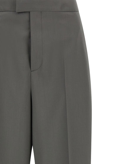 Trousers by Armarium for women in virgin wool gray features a sculptural silhouette, showcasing a sculptural wide and long with a sophisticated for a sculptural finish.