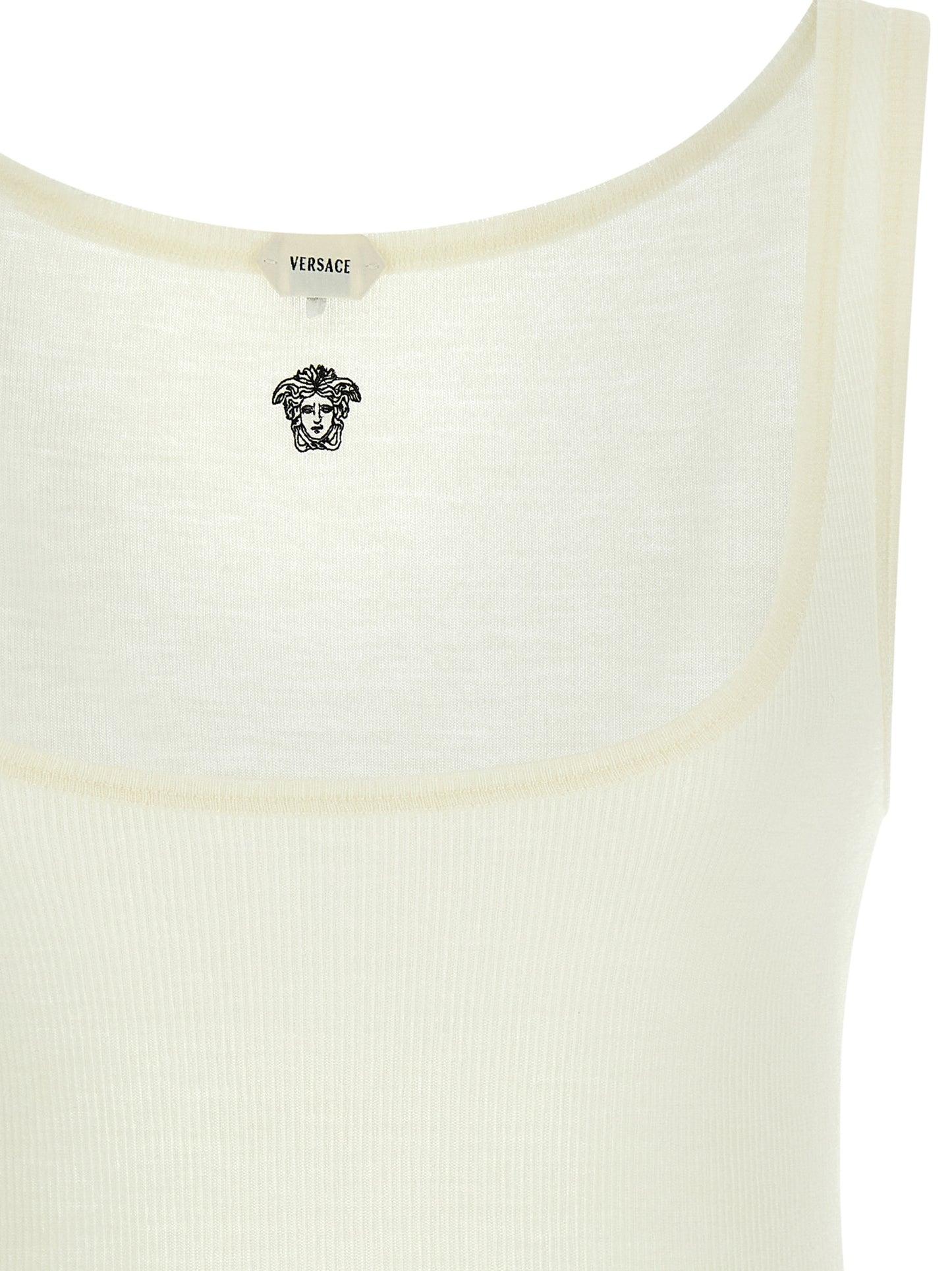 T-Shirt by Versace for women in virgin wool white features an edgy silhouette, meticulously detailed with a sophisticated and round neckline for a truly edgy finish.