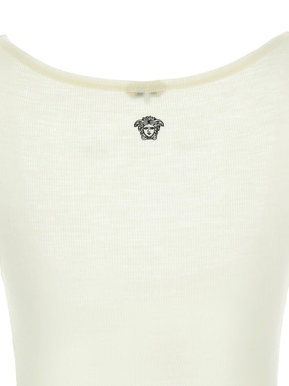 T-Shirt by Versace for women in virgin wool white features a plush silhouette, showcasing a sophisticated and for a truly plush finish.