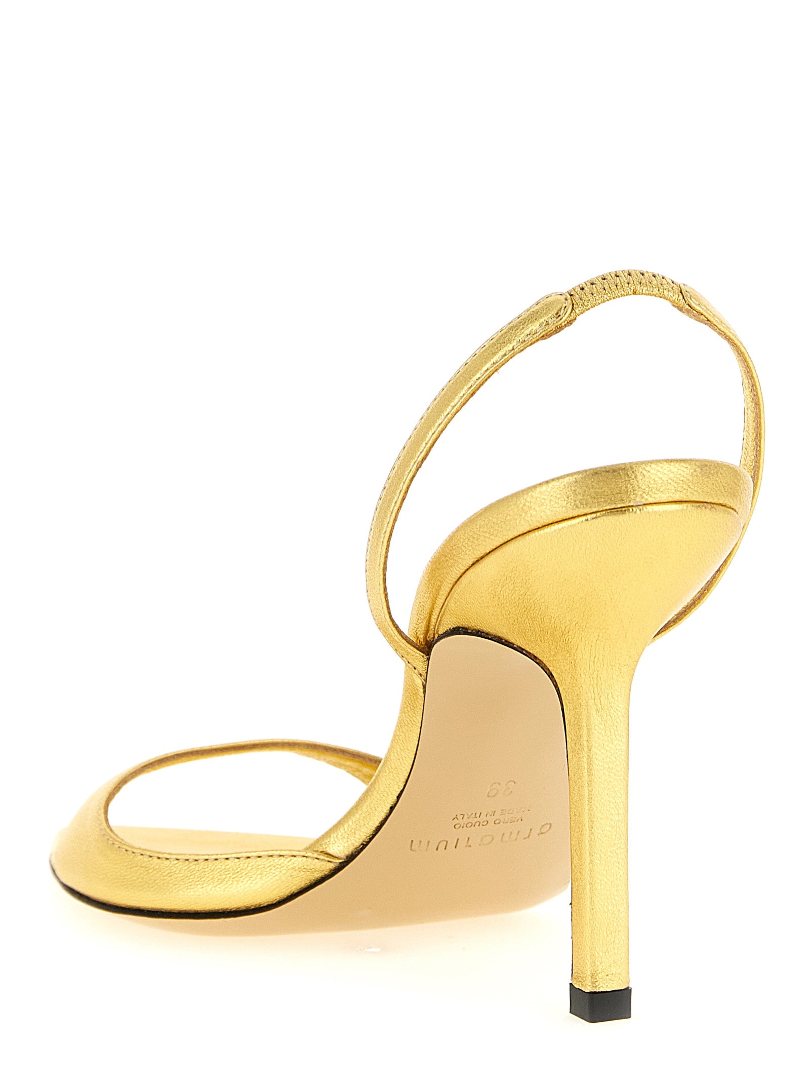 Stiletto Ankle Strap Sandals by Armarium for women in nappa lambskin leather gold & natural features an statuesque Women's Nappa Lambskin Leather Stiletto Ankle Strap Sandals silhouette with a refined stiletto and elegant pointed toe style.
