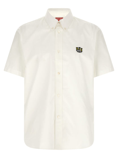 Shirt by Kenzo for men in cotton white presents a discerning silhouette, showcasing a sophisticated and short-sleeve for a truly discerning finish.