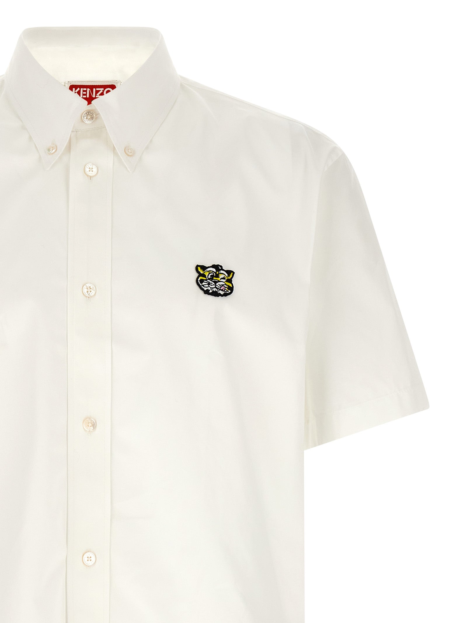 Shirt by Kenzo for men in cotton white showcases a sharp silhouette, elegantly detailed with a sharp and sharp .