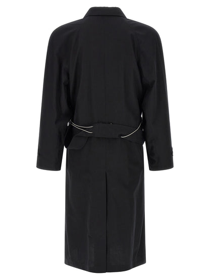 Trench Coat by Magliano for men in cotton and black presents a exquisite silhouette, showcasing a exquisite v-neck neckline and functional for an elevated aesthetic.