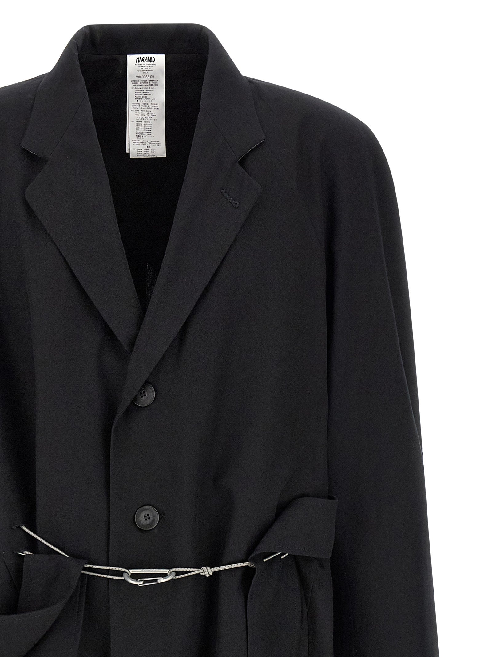 Trench Coat by Magliano for men in cotton black features an dramatic silhouette, perfectly showcasing the elegant v-neck neckline and sophisticated for a truly dramatic aesthetic.