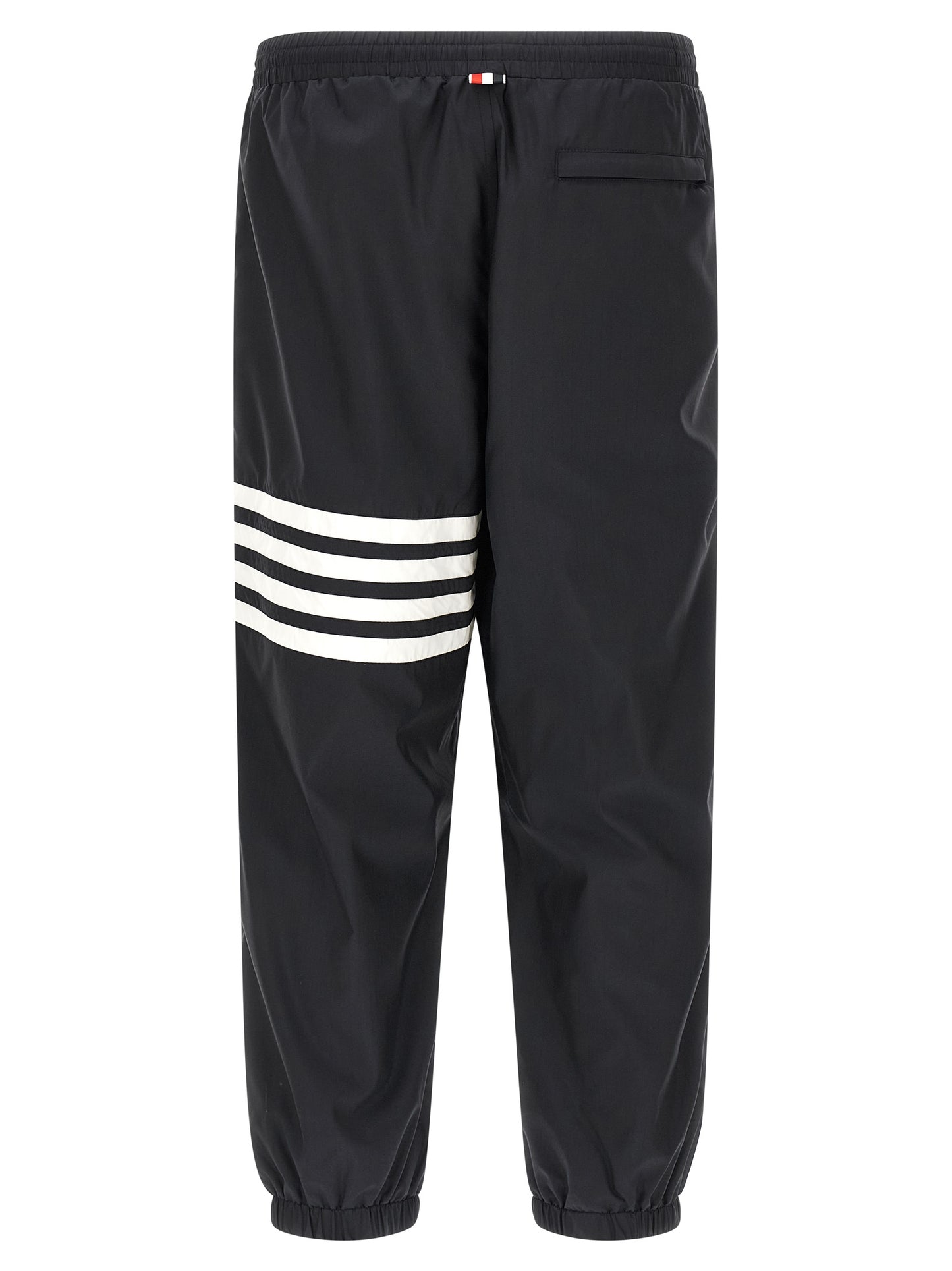 Joggers by Thom Browne for men in polyamide & polyester blue & print presents a tailored silhouette, showcasing a tailored straight-leg and long cut with a refined for a truly tailored aesthetic.