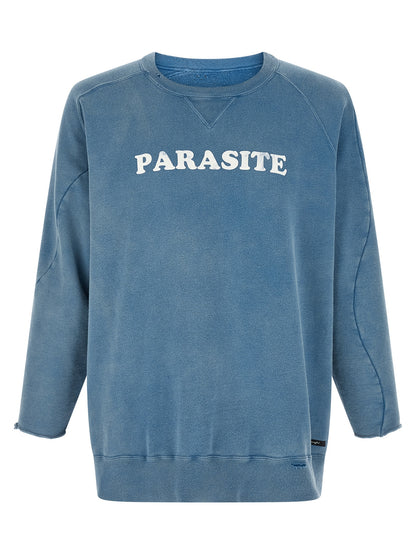 Sweatshirt by Undercover for men in cotton light-blue & print features an provocated silhouette, detailed with a provocated three-quarter-sleeve and a refined crew asymmetric neckline for a sophisticated aesthetic.
