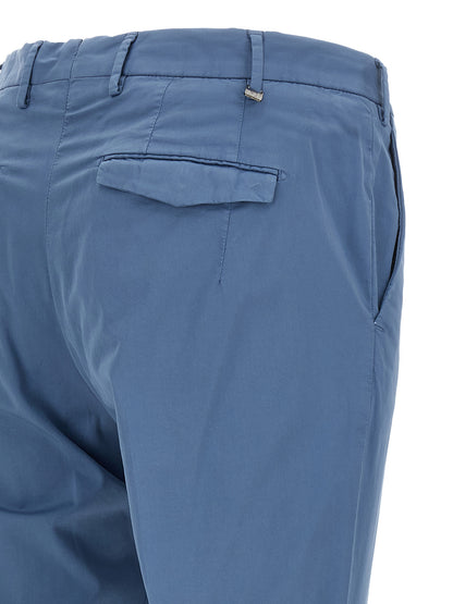 Casual Pants by PT Torino for men in stretch cotton light-blue features an refined tailoring silhouette, showcasing a premium with a mid rise and long cut for a refined tailoring look.