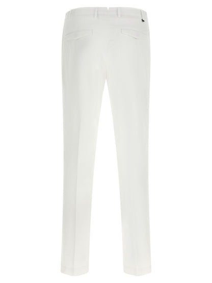 Trousers by PT Torino for men in stretch cotton white presents a perennial silhouette, meticulously tailored with a cut, long finish, and an elegant mid rise.