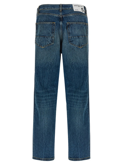 Jeans by Department 5 for men in denim cotton blue presents a tailored silhouette, showcasing a tailored straight-leg and long cut with a refined for a truly tailored aesthetic.