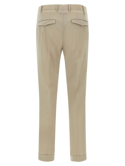 Trousers by PT Torino for men in virgin wool beige presents a perennial silhouette, meticulously tailored with a cut, long finish, and an elegant mid rise.