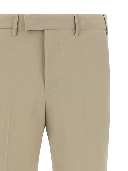 Trousers by PT Torino for men in virgin wool beige features a tailored silhouette with a tailored , defined by its long and a sophisticated mid rise.