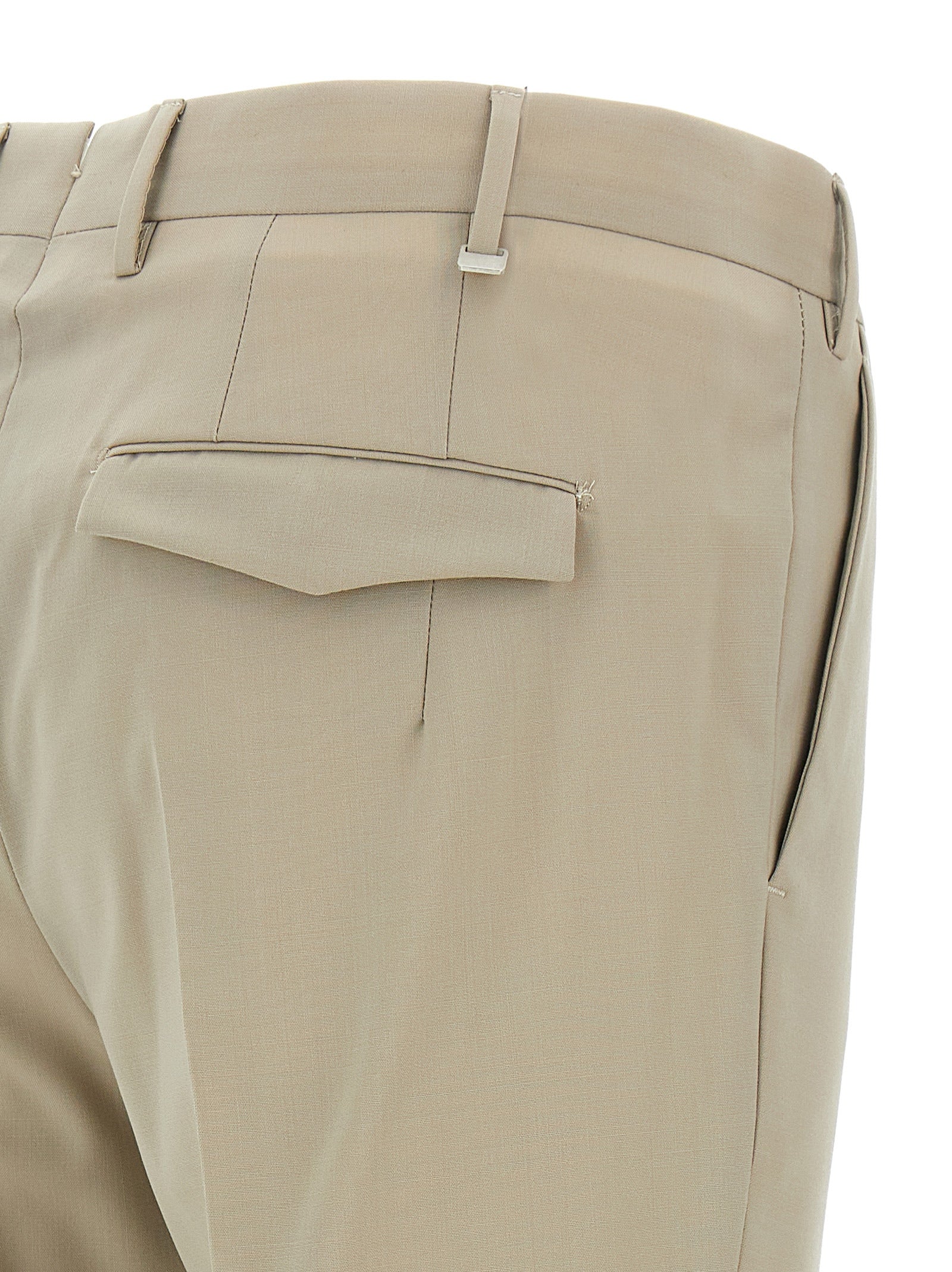 Trousers by PT Torino for men in virgin wool beige features a sculptural silhouette, showcasing a sculptural and long with a sophisticated mid rise for a sculptural finish.