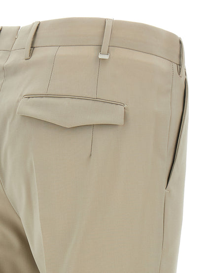 Trousers by PT Torino for men in virgin wool beige features a sculptural silhouette, showcasing a sculptural and long with a sophisticated mid rise for a sculptural finish.