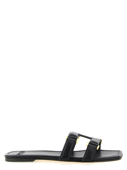 Sliders Sandals Flat Shoes by Elisabetta Franchi for women in nappa lambskin leather black presents a effortless chic silhouette, showcasing the Women's Nappa Lambskin Leather Sliders Sandals Flat Shoes design with a effortless chic and for a sophisticated look.