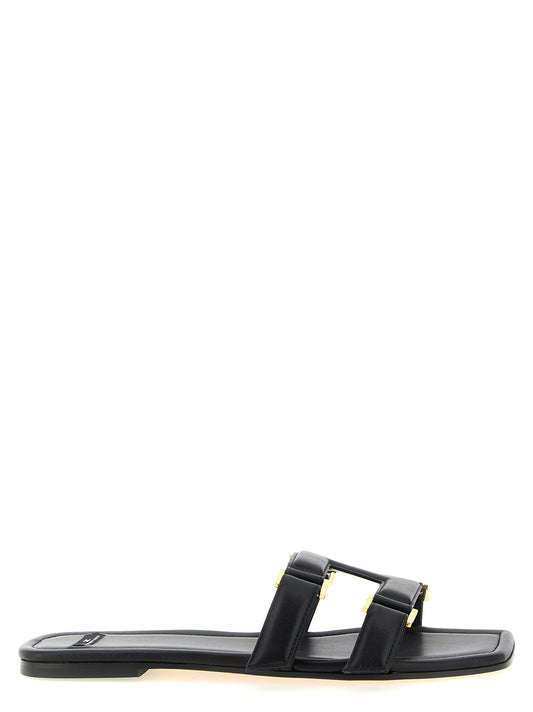 Sliders Sandals Flat Shoes by Elisabetta Franchi for women in nappa lambskin leather black presents a effortless chic silhouette, showcasing the Women's Nappa Lambskin Leather Sliders Sandals Flat Shoes design with a effortless chic and for a sophisticated look.
