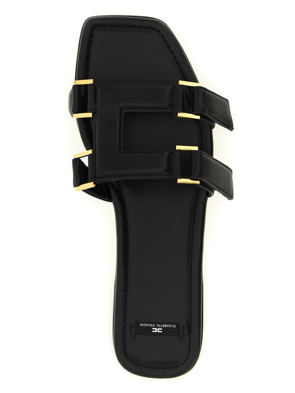 Sliders Sandals Flat Shoes by Elisabetta Franchi for women in nappa lambskin leather black features an statuesque silhouette from the Women's Nappa Lambskin Leather Sliders Sandals Flat Shoes collection, showcasing a and a statuesque for a statuesque look.