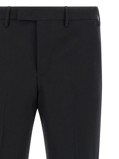 Trousers by PT Torino for men in virgin wool black features a sculptural silhouette, showcasing a sculptural and long with a sophisticated mid rise for a sculptural finish.