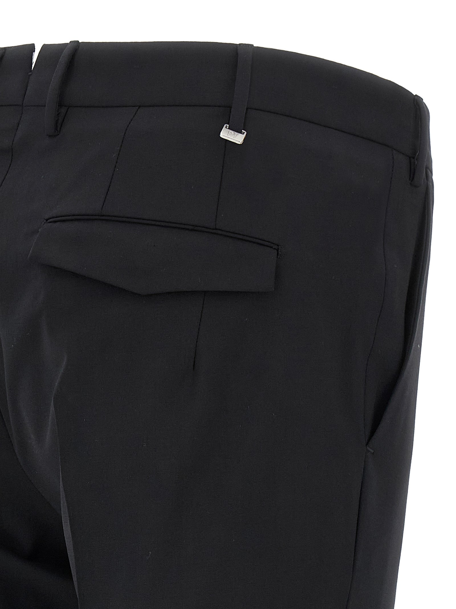 Trousers by PT Torino for men in virgin wool black presents a perennial silhouette, meticulously tailored with a cut, long finish, and an elegant mid rise.