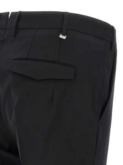Trousers by PT Torino for men in virgin wool black presents a perennial silhouette, meticulously tailored with a cut, long finish, and an elegant mid rise.