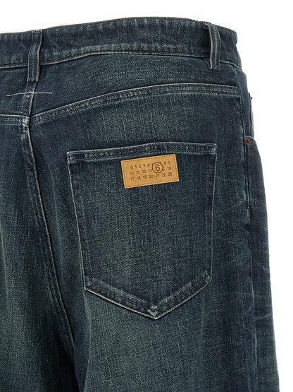 Jeans by MM6 Maison Margiela for men in denim cotton blue, white & signature presents a refined pantology silhouette, artfully defined by a refined pantology straight-leg, relaxed-fit, regular-fit & wide, long, and a sophisticated .