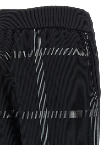Casual Pants by PLEATS PLEASE ISSEY MIYAKE for women in polyester & nylon black & patterned features an sartorial wide and long with a cut for a sartorial finish.