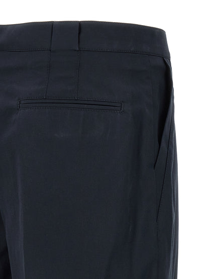 Chinos Pants by Brunello Cucinelli for men in cotton blue features an utilitarian-chic silhouette, showcasing a utilitarian-chic straight-leg & regular-fit with a long cut and for a refined look.