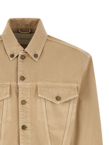 Trucker Jacket by Entire Studios for men in denim cotton beige features a dramatic silhouette, showcasing a sophisticated shirt-collar neckline and distinctive pockets & insulated for a dramatic aesthetic.