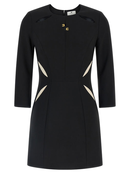 Dress by Elisabetta Franchi for women in stretch polyester bicolour, black & white features an eye catching silhouette with a sophisticated , elegant long-sleeve, and a refined short mini for a eye catching aesthetic.