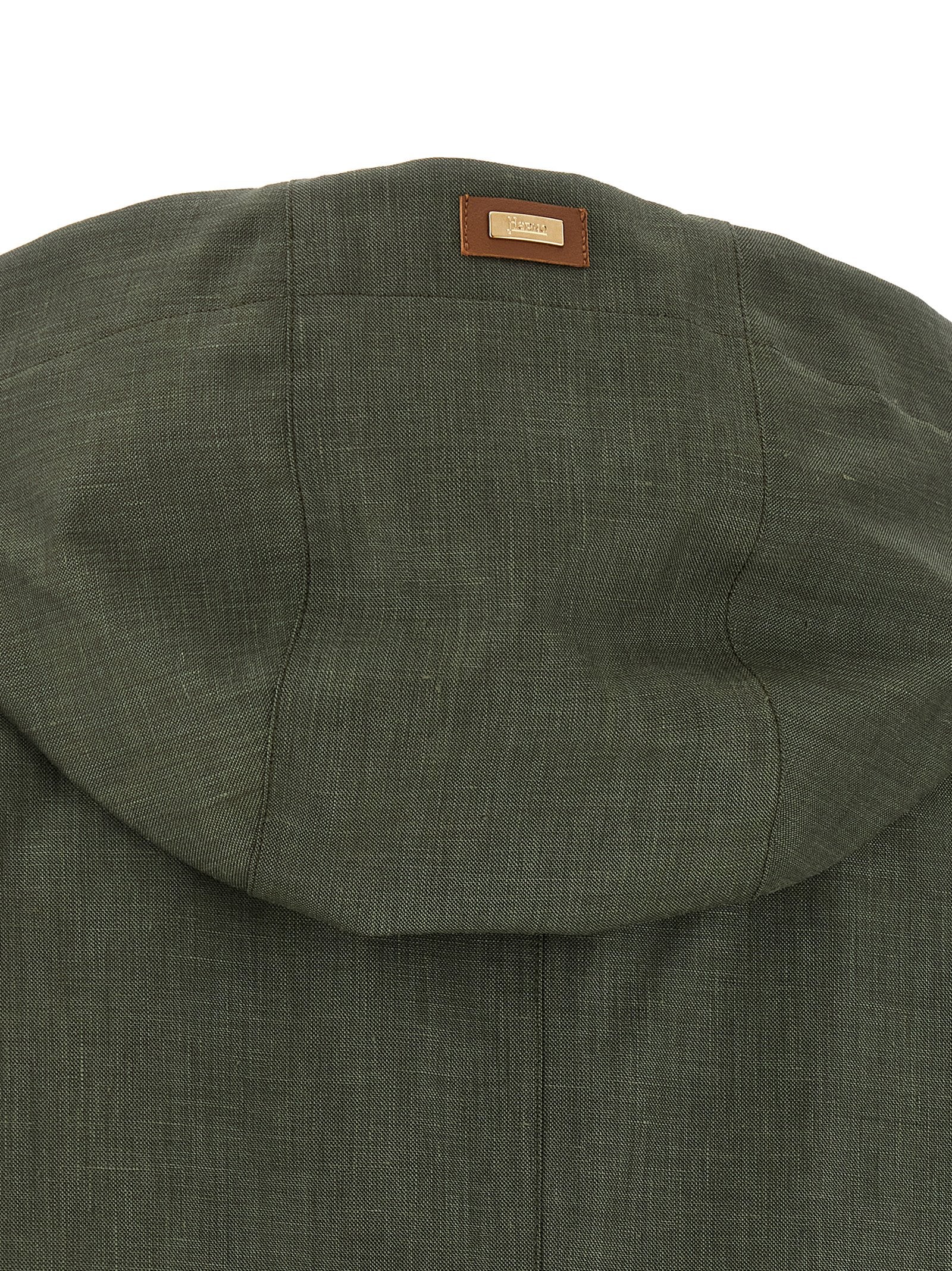 This Herno women silk linen wool Hooded Trench Coat in bicolour & green presents a high style silhouette, meticulously detailed with water-resistant & hooded and a high style hooded neckline for a sophisticated, timeless look.