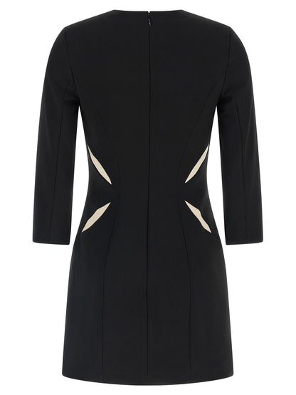 Dress by Elisabetta Franchi for women in stretch polyester bicolour, black & white presents a sinuous silhouette, showcasing a sophisticated and detailed with a sinuous short mini for a refined finish.