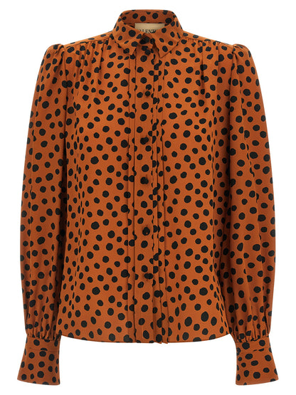 Blouse by Valentino Garavani for women in silk orange & print presents a discerning silhouette, showcasing a sophisticated and long-sleeve for a truly discerning finish.