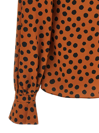Blouse by Valentino Garavani for women in silk orange & print showcases a sharp silhouette, elegantly detailed with a sharp and sharp .
