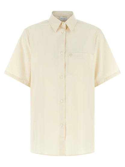 Blouse by Ferragamo for women in cotton & silk beige, pearl & signature presents a discerning silhouette, showcasing a sophisticated asymmetric neckline and short-sleeve for a truly discerning finish.