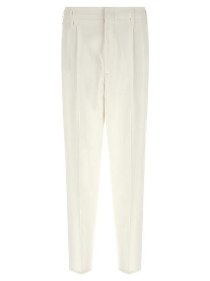 Trousers by Brunello Cucinelli for men in cotton white features a sculptural silhouette, showcasing a sculptural tapered-leg and long with a sophisticated high rise for a sculptural finish.