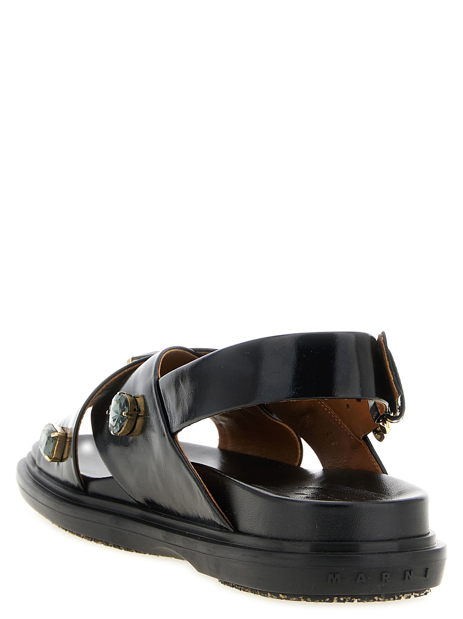 Flat Sandals by Marni for women in sheep lamb leather & crystal black presents a sculptural silhouette, showcasing the Women's Sheep Lamb Leather & Crystal Flat Sandals design with a sculptural flat and for a premium look.