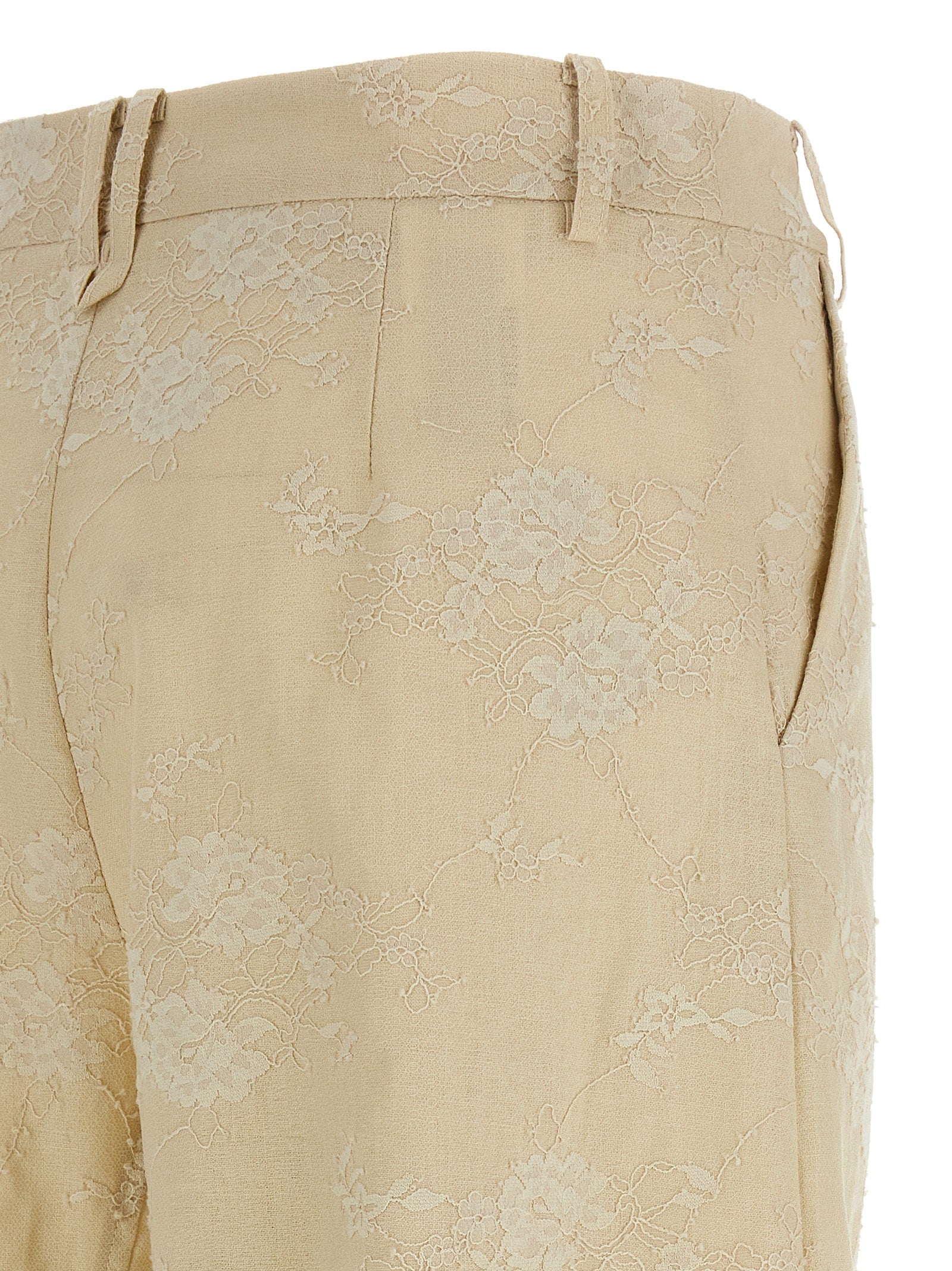 Trousers by PINKO for women in linen beige presents a perennial silhouette, meticulously tailored with a flared & wide cut, long finish, and an elegant mid rise.