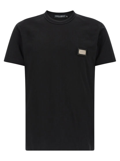 T-Shirt by Dolce & Gabbana for men in leather & cotton black showcases a unassuming silhouette, artfully detailed with a refined crew neckline and unassuming short-sleeve for a sophisticated, contemporary look.