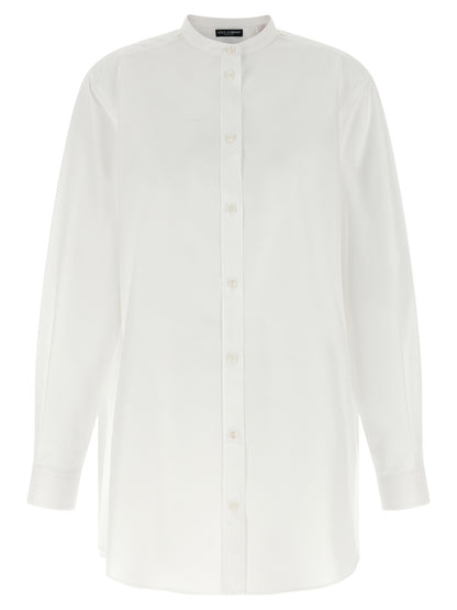 Blouse by Dolce & Gabbana for women in cotton & silk pearl, white & patterned showcases a sublime silhouette, artfully detailed with a sublime mandarin neckline and for a sophisticated, sublime finish.
