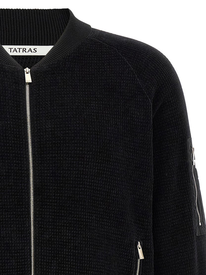 This Bomber Jacket by Tatras for men in nylon cotton polyester black exhibits a edgy silhouette, meticulously detailed with functional pockets and a edgy high-neck neckline for a edgy finish.
