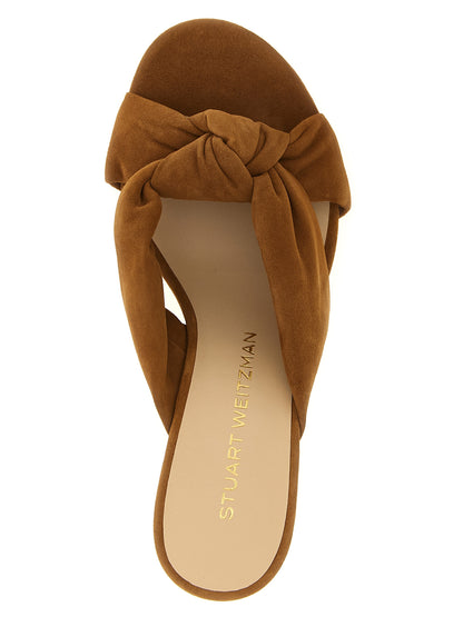 Stiletto Slider Sandals by Stuart Weitzman for women in polyethylene polyurethane suede leather brown features an exquisite silhouette, showcasing the exquisite Women's Polyethylene Polyurethane Suede Leather Stiletto Slider Sandals with a stiletto and .