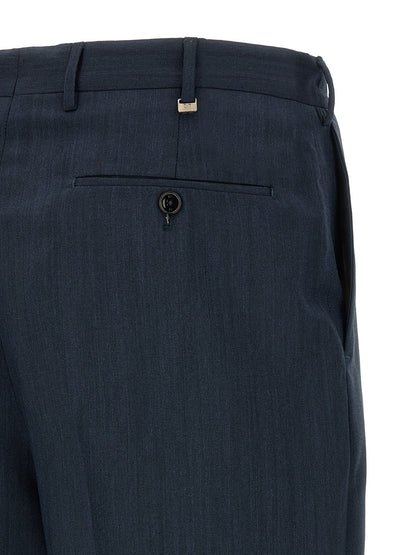 Trousers by PT Torino for men in virgin wool blue presents a perennial silhouette, meticulously tailored with a straight-leg cut, long finish, and an elegant .