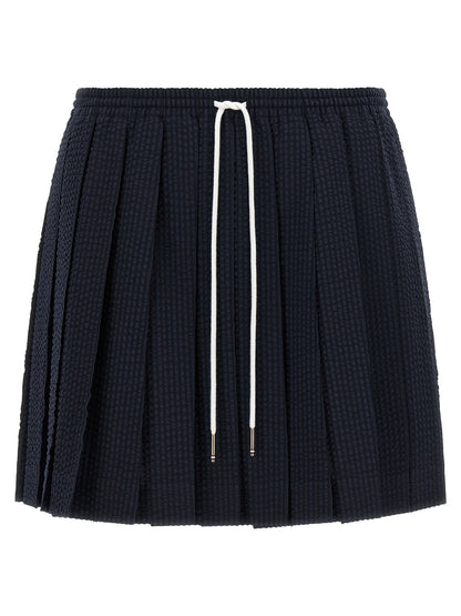 Skirt by Thom Browne for women in wool blue & striped features a captivating silhouette, showcasing the captivating Women's Pleated Flared Wool Mini Long Skirt design with a sophisticated mini long for a captivating look.