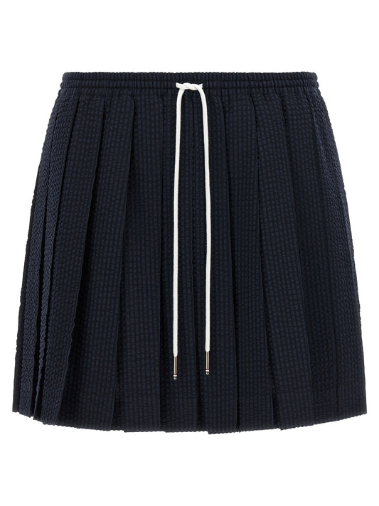 Skirt by Thom Browne for women in wool blue & striped features a captivating silhouette, showcasing the captivating Women's Pleated Flared Wool Mini Long Skirt design with a sophisticated mini long for a captivating look.