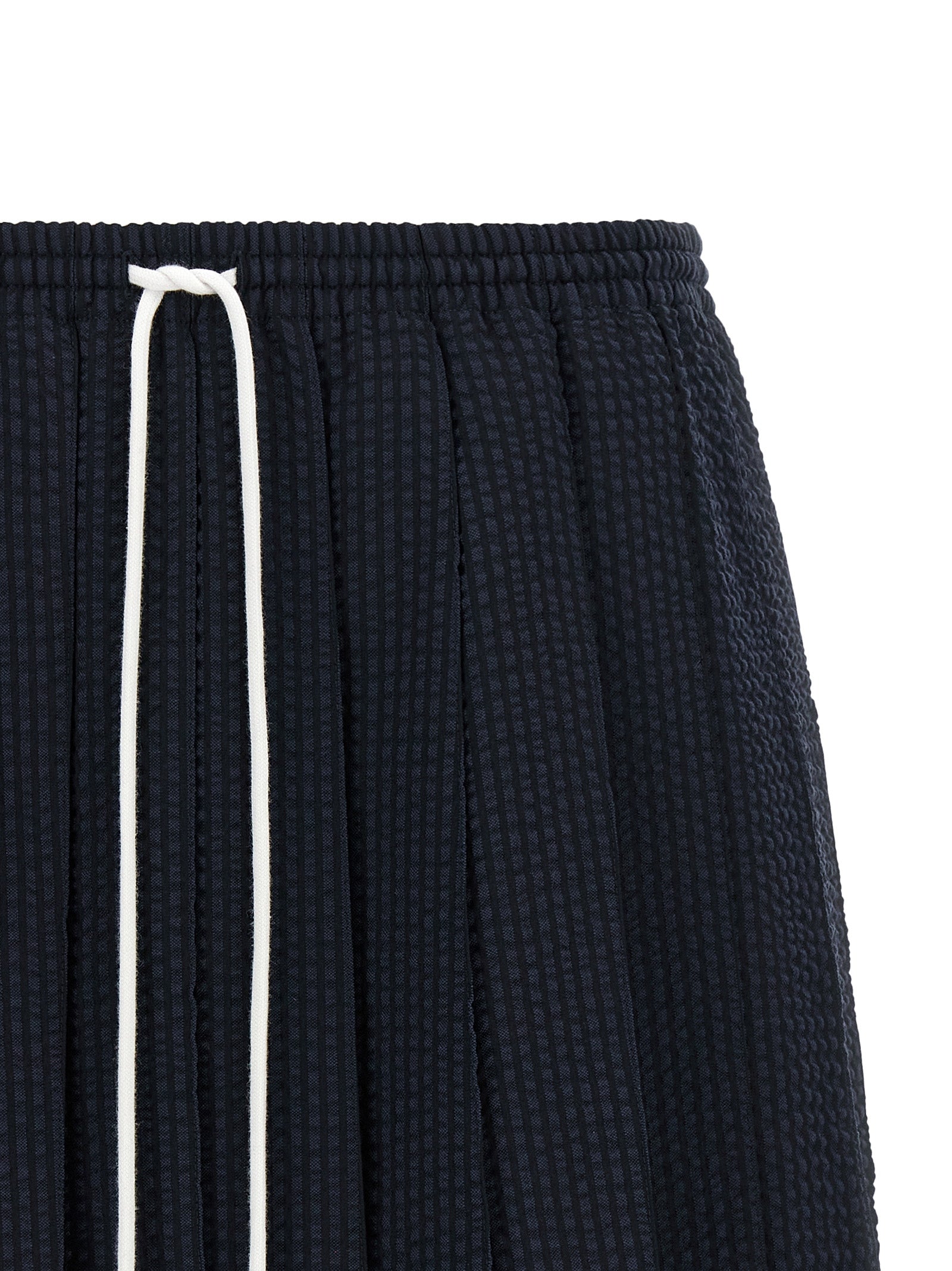 Skirt by Thom Browne for women in wool blue & striped showcases a sultry silhouette, elegantly defined by its mini long and the sophisticated sultry design of the Women's Pleated Flared Wool Mini Long Skirt.