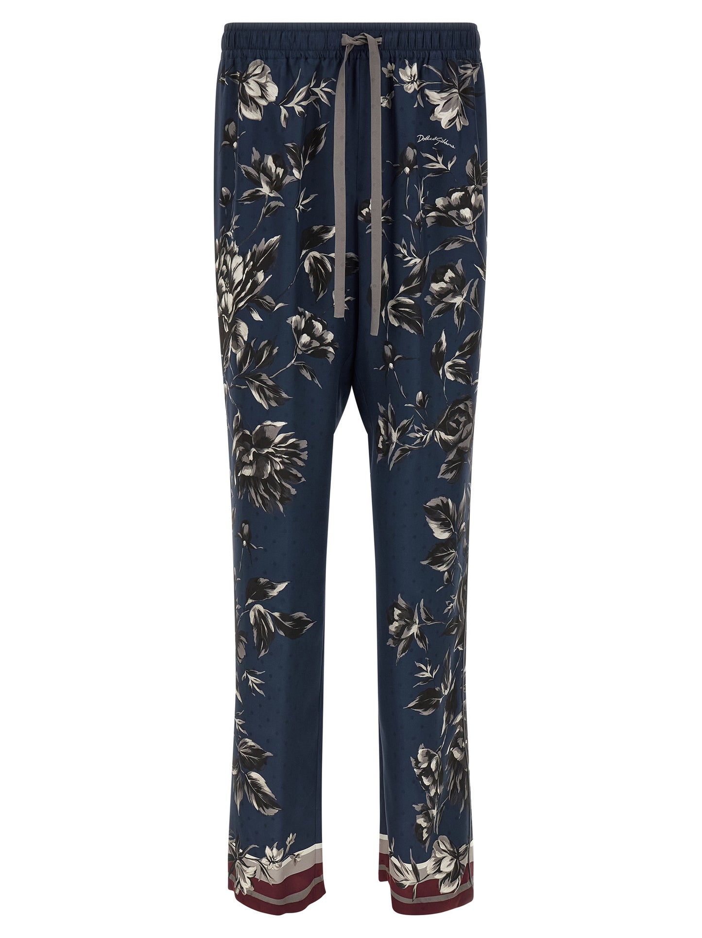 Trousers by Dolce & Gabbana for men in silk twill blue & print features a tailored silhouette with a tailored straight-leg & wide, defined by its long and a sophisticated .