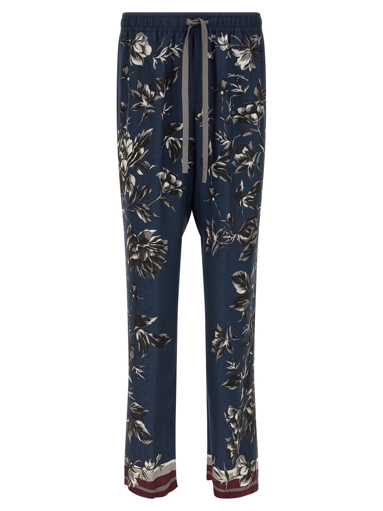 Trousers by Dolce & Gabbana for men in silk twill blue & print features a tailored silhouette with a tailored straight-leg & wide, defined by its long and a sophisticated .